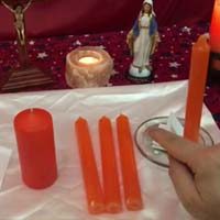 rituales con velas naranjas
