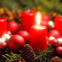 Advent wreath with one burning candle